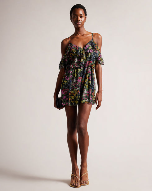 PRIYAHH-Trousers-Need an outfit to match your sunny disposition? Look no further than PRIYAHH. With ruffled off-shoulder sleeves and a flattering V-neck, this romper is perfect for any occasion from weekend brunch to a beach day. Plus, adjustable straps ensure a comfortable fit.The fabric of this product is made with 55% recycled polyester. Using recycled polyester helps divert plastic waste from ending in landfills, and helps us to reduce our dependence on virgin materials. Romper Off shoulder sleeves with
